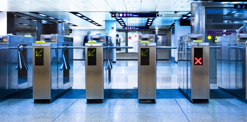 Railway turnstiles, representing gated and ungated content