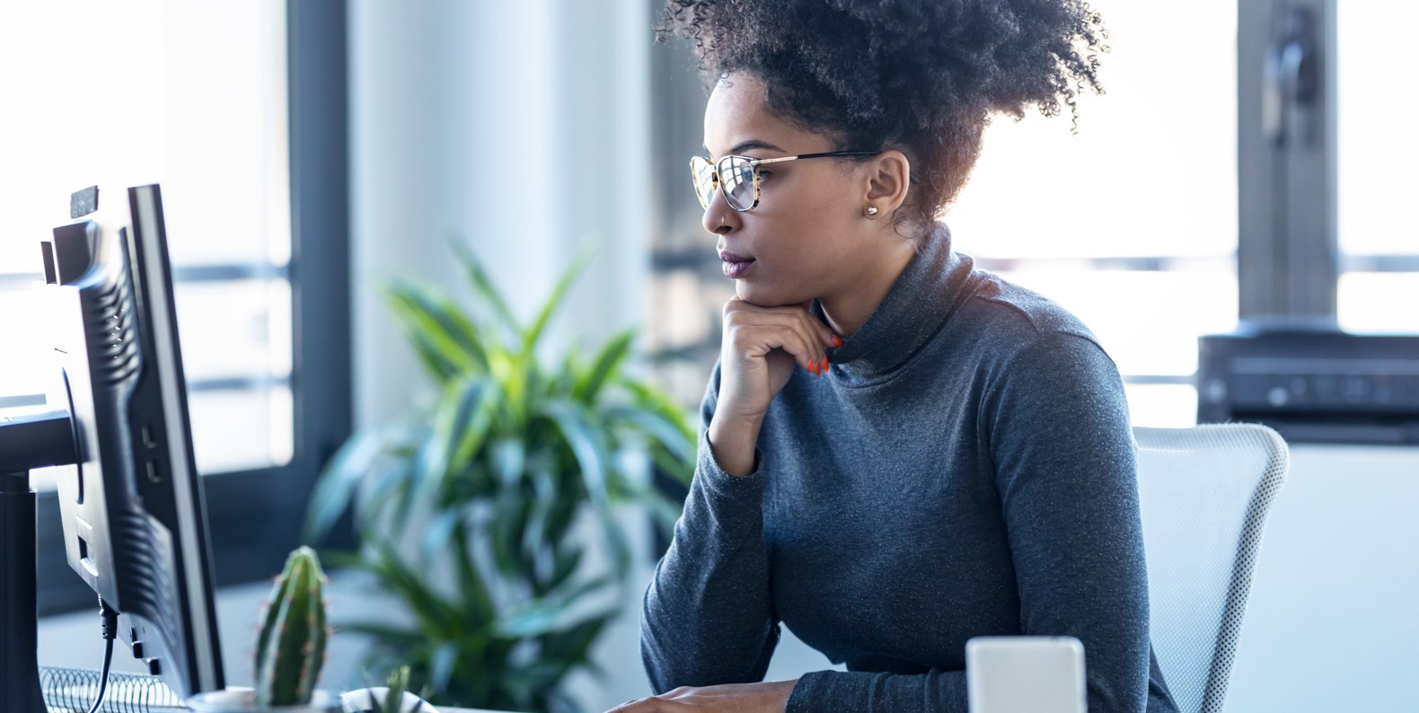 woman looking at computer