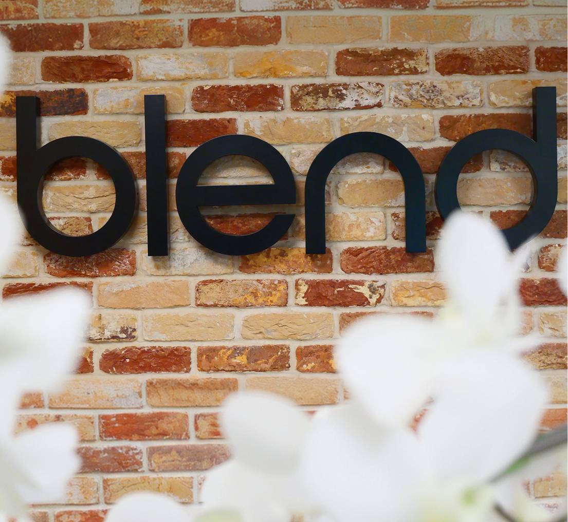 Blend logo on brick wall